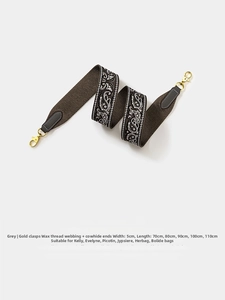 5cm wide grey paisley woven strap with leather ends and gold-tone swivel hooks