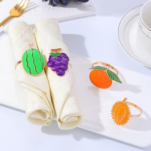 Creative fruit napkin rings set in gold metal with colorful enamel for table decor