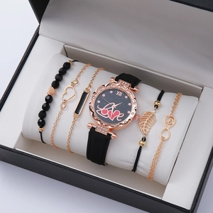 Detail of quartz watch with LOVE dial and 4 layered bracelets in a gift box