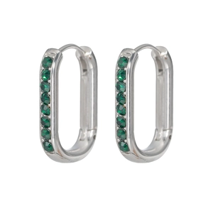 Macro detail of U-shaped silver earrings featuring inlaid green gemstones and secure closure