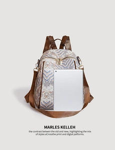 Retro wave print backpack with brown PU straps shown next to a tablet for size reference