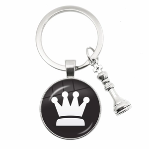 Silver chess keychain with a crown glass pendant and a 3D chess piece charm for gifting