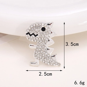 Macro view of crystal encrusted dinosaur charm with 3.5cm height and 2.5cm width