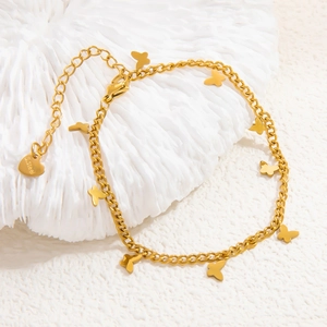 Detail of 18k gold plated stainless steel chain with delicate butterfly pendants