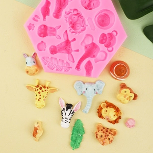 Pink silicone mold for forest animal fondant shapes like giraffes and lions for baking