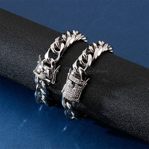 Polished stainless steel Cuban link necklaces with smooth and rhinestone-encrusted clasps