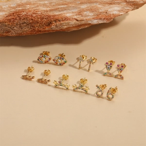 Chic gold-plated stud earring set featuring colorful zircon in arrow and eye designs