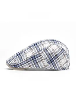 Side view of plaid newsboy cap showing blue and brown breathable checkered fabric detail