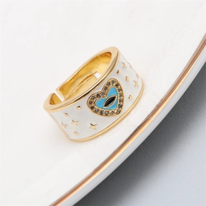 Gold-plated white enamel heart evil eye ring with micro-set zircon stars and open band