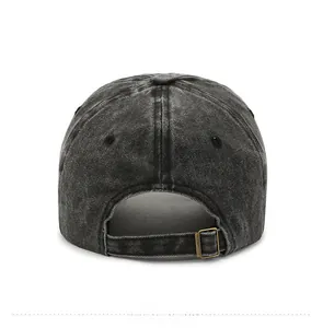 Detail view of the vintage washed baseball cap back with adjustable metal buckle strap