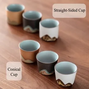 Japanese style ceramic tea cup set with mountain relief and elegant light blue glaze
