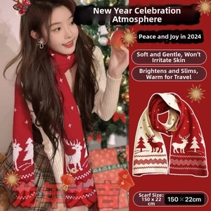 Detail view of 150x22cm red Christmas scarf with reindeer and snowflake patterns