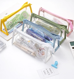 Detailed top view of five colorful transparent PVC pencil cases in a minimalist style