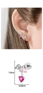 Detail view of pink heart bow cartilage stud earring showing dimensions 1.0cm by 0.68cm