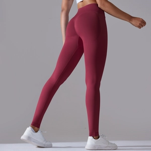 Detailed back view of high-waisted seamless red yoga pants with scrunch butt lift effect