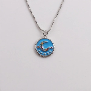 Star and moon silver necklace with blue enamel pendant and colorful zircon stones