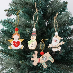 Set of 4 Christmas wooden ornaments featuring Santa and Snowman on green pine branches