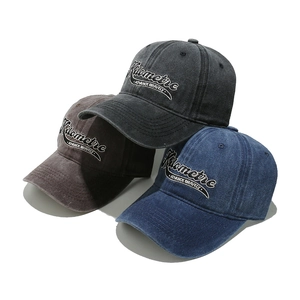 Vintage washed cotton baseball caps in black, grey, and denim blue with 3D embroidery