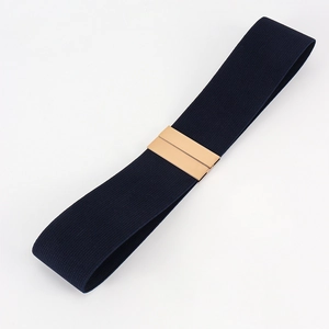 Close-up of navy blue elastic waist belt with a polished gold rectangular metal buckle