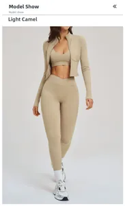 Detailed view of light camel three-piece fitness set with high waist pockets and zipper jacket