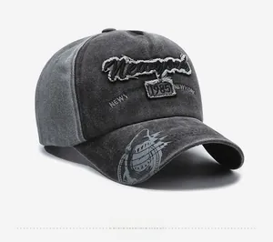 Detail view of washed gray vintage baseball cap with Newyork embroidery and shark print