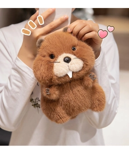 Detailed view of fluffy brown marmot plush toy with soft texture and cute facial features