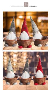 Three-piece set of Christmas gnomes sitting in woven candy baskets for holiday decor