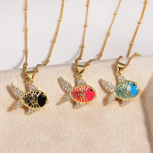 Detail of colorful goldfish pendants in black, red, and blue with sparkling crystals