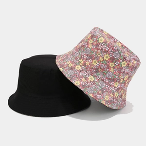 Floral and black double-sided bucket hats for sun protection and outdoor leisure style