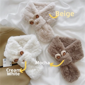 Three plush cross scarves in cream, mocha and camel with cute bear ear embroidery detail