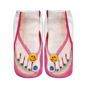 Detailed view of white socks with 3D flip-flop print and blue nail polish design
