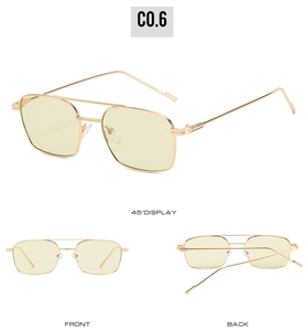 Trois angles de lunettes de soleil en métal doré avec verres jaunes et double pont