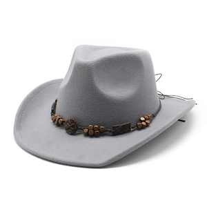 Detail of grey wool felt western cowboy hat with brown wooden beaded decorative band