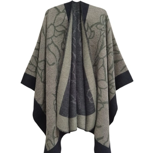 Women's acrylic knit shawl with abstract ink jacquard pattern and split cape style