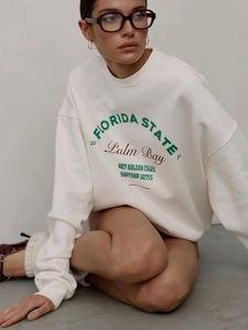 Classic white crewneck sweatshirt with retro Florida State college style graphic print