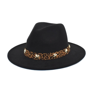 Detail of a black wool felt fedora featuring a leopard print band with gold floral accents