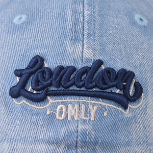 Distressed blue denim baseball cap featuring London ONLY 3D embroidery and washed texture