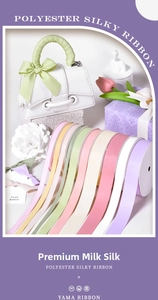 Detailed view of colorful silky polyester ribbons in rolls for gift packaging and DIY