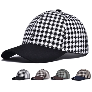 Classic houndstooth baseball cap with curved brim and contrast color paneling style
