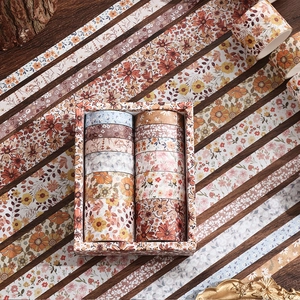 Vintage floral washi tape set in a decorative gift box for DIY scrapbooking and crafts
