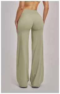Detail view of high-waist wide-leg sports trousers with V-shaped rear contouring
