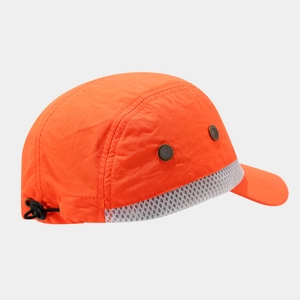 Detail of high-visibility orange safety hat featuring breathable mesh and adjustable drawcord