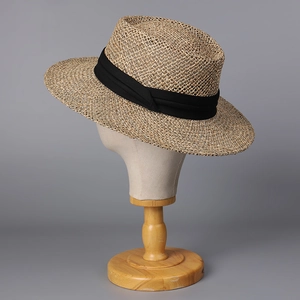 Classic beige woven straw fedora with black ribbon band for summer beach sun protection