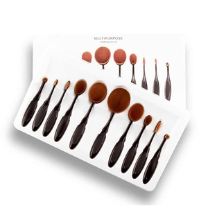 Detail of 10-piece oval makeup brush set with dense brown bristles and black handles