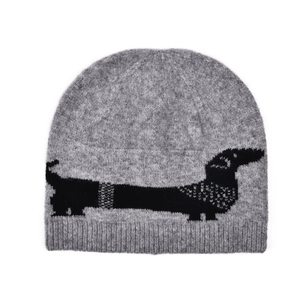 Close-up of grey wool knit beanie with dachshund pattern and ribbed cuff detail