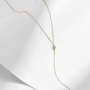 Minimalist 925 sterling silver gold-plated necklace with clear round stone pendant
