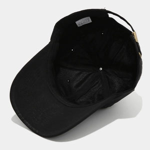 Detail view of quick-dry baseball cap interior with mesh lining and adjustable metal buckle