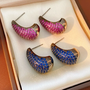 Detail of vintage teardrop earrings with pink and blue pavé zircon in gunmetal setting