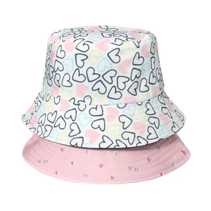 Women's heart print bucket hats in white and pink patterns for sun protection