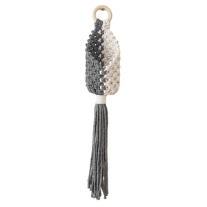 Detail of handcrafted grey and beige woven cotton macrame plant hanger with wooden ring